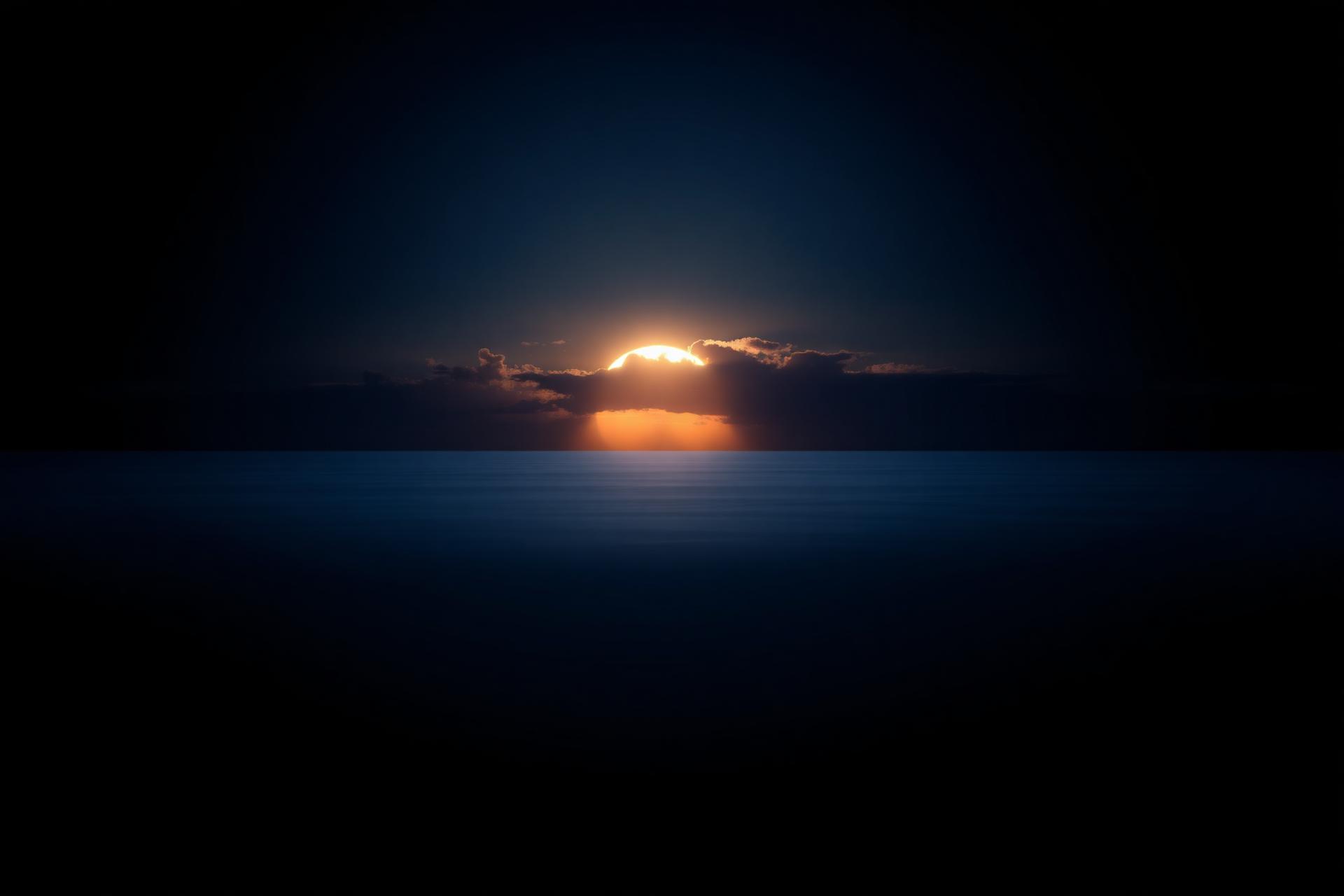 Light breaking through darkness at creation